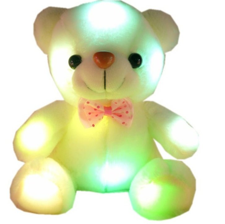 Soft plush toy bear دُبٌّ لُعْبَةٌ مِن القُطْعَةِ النَّاعِمَةِ – دُبٌّ تِدْي لامِعٌ مُلَوَّنٌ